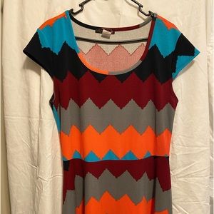 Be bold with this cap sleeve, multi-colored knee length dress by Myth.